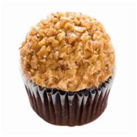 Salted Caramel Cupcake · Chocolate cupcake topped with salted caramel buttercream and rolled in toffee crunch.