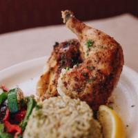 Kotopoulo- Baked Greek Chicken  · Slow roasted split chicken, rice pilaf, and roasted Mediterranean vegetables 