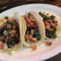 Beef Steak Taco · Folded tortilla with a variety of fillings such as meat or beans.