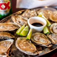 Ostiones · Fresh oysters in their shell.