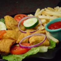 Pescado a la Cerveza · Strip of fresh fish deep fried in a special beer batter and served with fries.