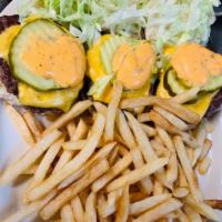 Mac Attack Sliders · 3 sliders. All beef patty, cheese, lettuce, pickle and special sauce. Served with fries or w...