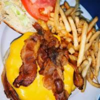 Bacon Cheese Burger · topped with American cheese, crispy bacon, lettuce, lettuce, a pickles served with fries or ...