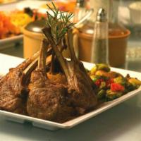 New Zealand Rack of Lamb · Seven prime lamb chops grilled and served with roasted vegetables, Afghan rice, Afghan bread...