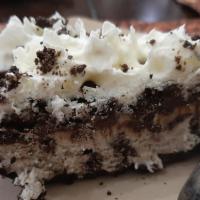 Cookies ＆ Cream Ice Cream Pie · A thick slab of Sweet Cream ＆ Cookies ice cream on an Oreo’s Crust covered with a layer of o...