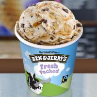 Coconut Seven Layer Bar · Coconut ice cream with coconut and fudge flakes, walnuts and swirls of graham cracker and bu...