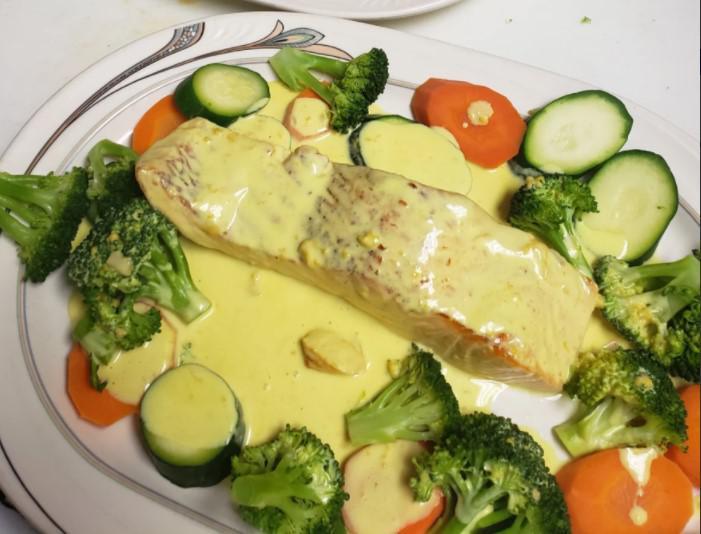 Salmon Mostaza · Mustard salmon. Salmon steak grilled and sauteed in creamy mustard sauce served over asparagus.