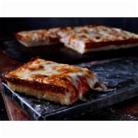 Jet's Detroit-Style Deep Dish Cheese Slice · Comes with premium mozzarella.