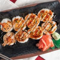 Shrimp Tempura Roll · Shrimp tempura, avocado, crab, cucumber topped with eel sauce.