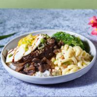 Loco Moco · Two 4 oz burger patties topped with sunny-side up egg and mushroom gravy over choice of base...