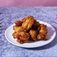 Aloha Wings · 10 pieces of golden chicken wings glazed with a sweet savory glaze.