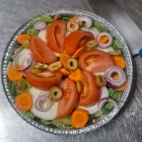 Garden Salad · Salad with fresh tomato,romaine lettuce,green olives,onion ,carrots and pickles 