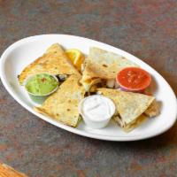 Quesadilla · Choice of style with melted cheddar and mozzarella cheeses on a flour tortilla with jalapeno...
