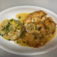 Chicken Francaise · Sauteed in a lemon butter sauce, served over rice. Served with soup or salad. 