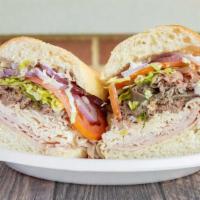 #5. The Street Sweeper Sandwich · Turkey, ham, roast beef, onion, lettuce, tomato and mayo.