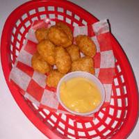 A10. Corn Nuggets · Ball of battered fried corn. 
