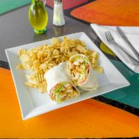 Chicken Caesar Wrap · Grilled chicken, romaine lettuce, fresh tomatoes and Caesar dressing.