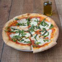Margherita Pizza · Tomato sauce, fresh mozzarella, basil and olive oil.
