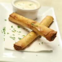 Spinach & Ricotta Cigars · Flaky fillo crust and bechamel.
