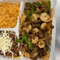 Sea and Land Plate · Comes with rice and beans, tortillas shrimp and steak .