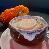French Onion Soup Dinner Special ·  A rich broth with hints of rosemary and port wine topped with imported cheese.