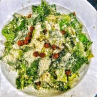 Classic Caesar Salad · Romaine lettuce, Parmesan, crispy chickpeas. Gluten-free.