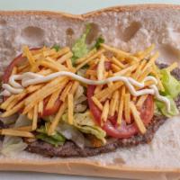 Pan con Bistec  · Cuban bread with steak, cooked onions, lettuce, tomatoes, mayonese and shoestring potatoes.