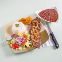 Palomilla Steak Lunch · White rice, beans, sweet plantains or salad.