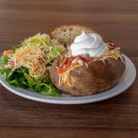 Original Stuffed Baked Potato · Butter, cheddar jack cheese, bacon, mushrooms and sour cream. Served with a fresh green sala...