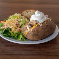 Southwest Stuffed Baked Potato · Marinated grilled chicken, black beans, sweet corn, diced red onion, cheddar jack cheese and...