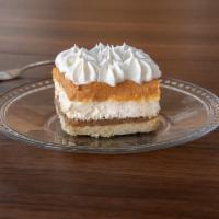 Butterscotch Layer Dessert · Layers of butterscotch pudding, cream cheese filling, a crunchy praline layer and whipped cr...