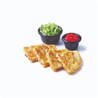 Kid's Chicken Quesadilla · A flour tortilla filled with chicken and ooey, gooey melted Cheddar cheese. Served with lett...