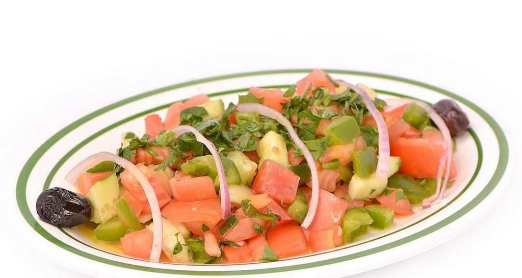 Shepherd Salad · Fresh tomatoes, green peppers, cucumbers, onions, parsley and olive oil lemon juice dressing. served with bread