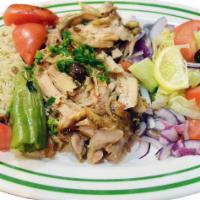 Chicken Doner/Turkish Gyro · Shawarma, Turkish gyro. Layers of marinated thigh wrapped around the large vertical split an...