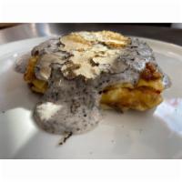 LASAGNA UMBRIA TARTUFO  · Lasagna Porcini mushrooms Sausages Truffle sauce and shaved black truffles 