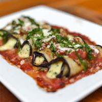 Eggplant Rollatini · Filled with ricotta, spinach and mozzarella, served family style.