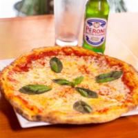Pizza Margherita · Plum tomato sauce, virgin olive oil, mozzarella and basil.