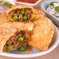 Whoa Meat Samosa · Deep fried Indian Pie (Indian Empanada) filled with spiced potatoes and other vegetables. 2 ...