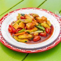 6. Pad Sweet Sour · Stir-fried with pineapple, tomatoes, onions, cucumber, bell pepper in sweet and sour sauce.