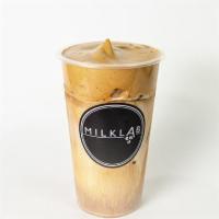 Dalgona Milk Cap Latte · Espresso milk cap with grass-fed milk.
