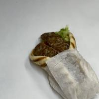 Lamb Gyro on Pita Combo · Served with steak fries and a can of soda.