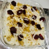 Homemade Rice Pudding · Delicious Homemade recipe with walnuts, dried cranberries, raisins, and coconuts. 