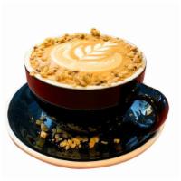 Crunchy-Na 10 oz. · Hazelnut flavored Cappuccino with oat milk topped off with Gluten Free Granola.