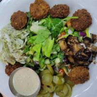 Falafel Salad · Mix leaves, Israeli salad, pickles, fried eggplant, pickled cabbage, and tahini.