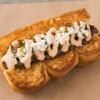 OLD TOWN · smoked bacon wrapped dog, caramelized onions, chipotle aioli, picked jalapeños, cotija cheese
