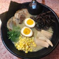 Tonkatsu Ramen · Our most popular ramen is made from a slow-simmered pork-based bone broth by boiling ground ...