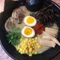 Spicy Tonkatsu Ramen · Our most popular ramen is made from a slow-simmered pork-based bone broth by boiling ground ...