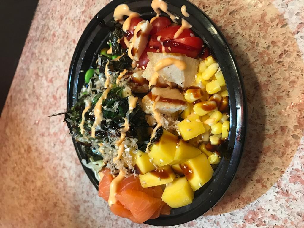 Build Your Own Poké Bowl · The poké bowl is totally customizable and built in 5 steps. Please choose a base first, then the protein, up to 3 mix-ins with no additional charge, 3 toppings and then your choice of sauce.