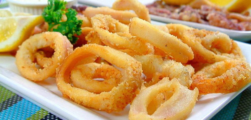 Fried Calamari · Lightly battered and fried calamari served with a side of spicy Mayo 