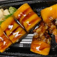 Golden Ship Roll · Spicy tuna,shrimp tempura inside and top w.fresh mango w.chef's special sauce.